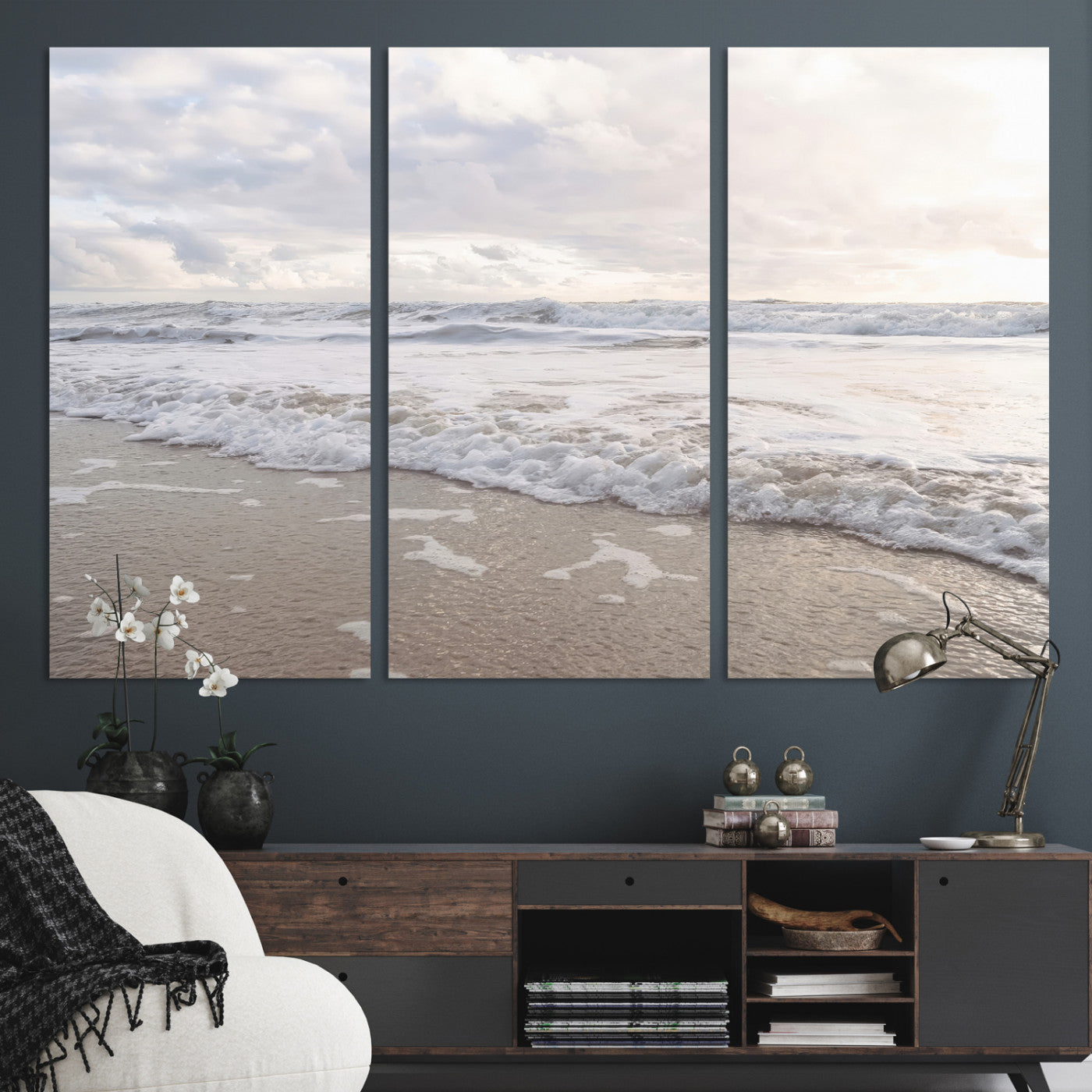 Peaceful ocean waves rolling onto the sandy shore under soft light, perfect for neutral or coastal minimalist decor themes.