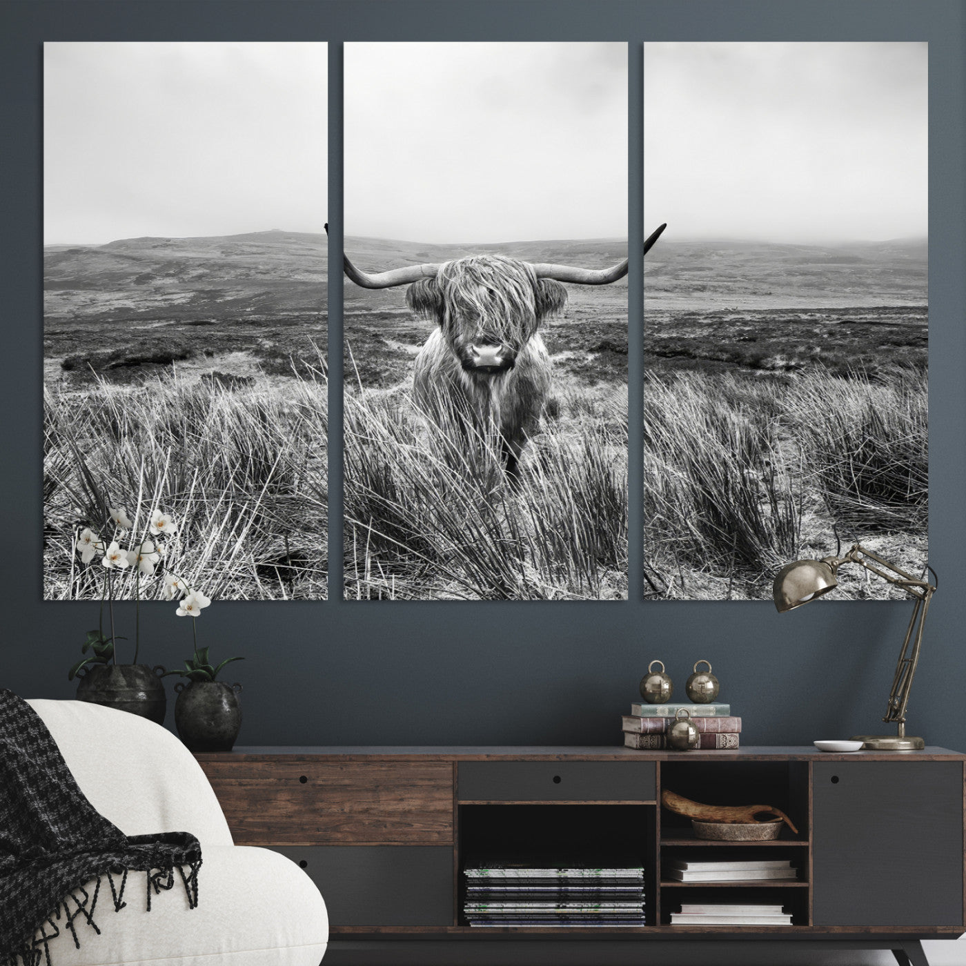 A black and white portrait of a Highland cow in a foggy Scottish countryside, capturing a rustic aesthetic and tranquil farm escape.