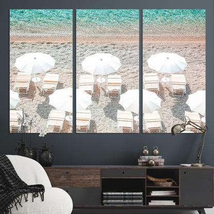 A bright beach scene with white umbrellas, pastel sand, and turquoise waters, creating a tranquil coastal vibe, perfect for beach house or summer decor.