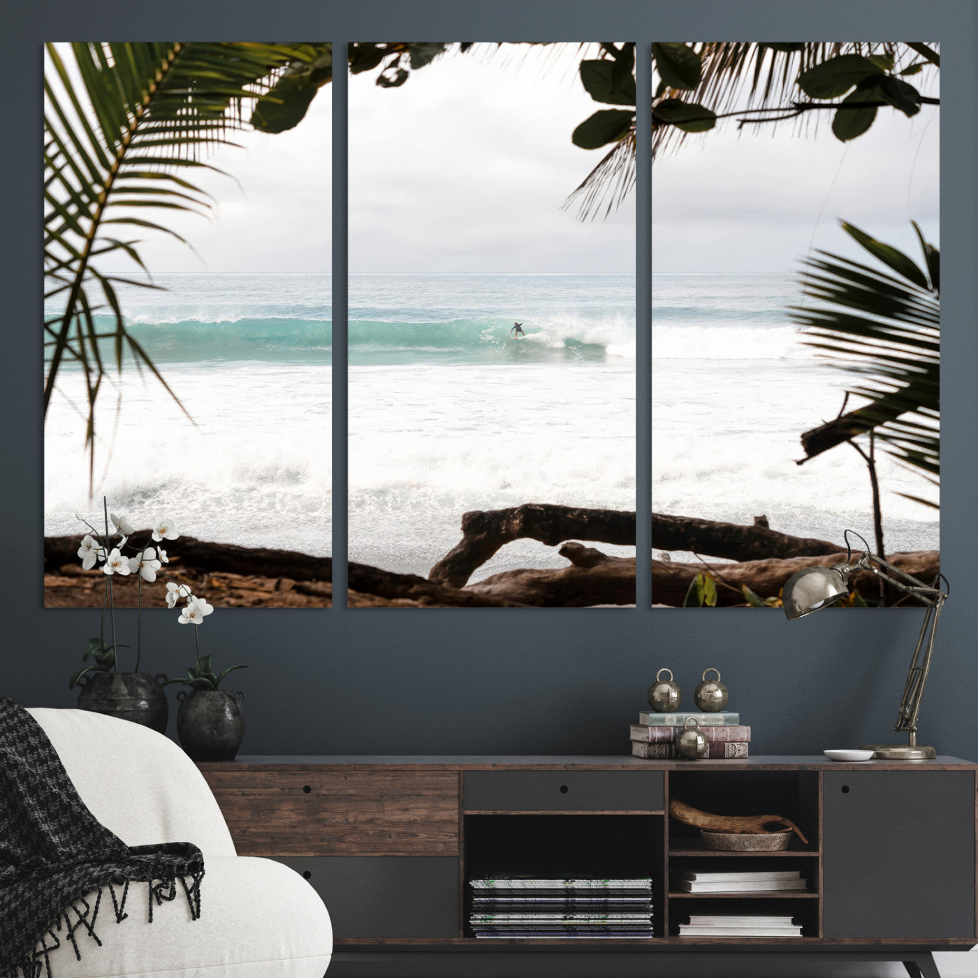 Tropical beach view with palm trees and surfer riding a wave, perfect for boho or coastal-inspired interior wall decor.