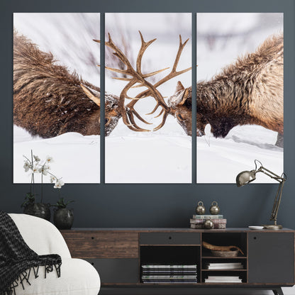 Two elk clashing antlers in a snowy forest, capturing raw power and wild energy, ideal for rustic cabin or lodge-style decor.