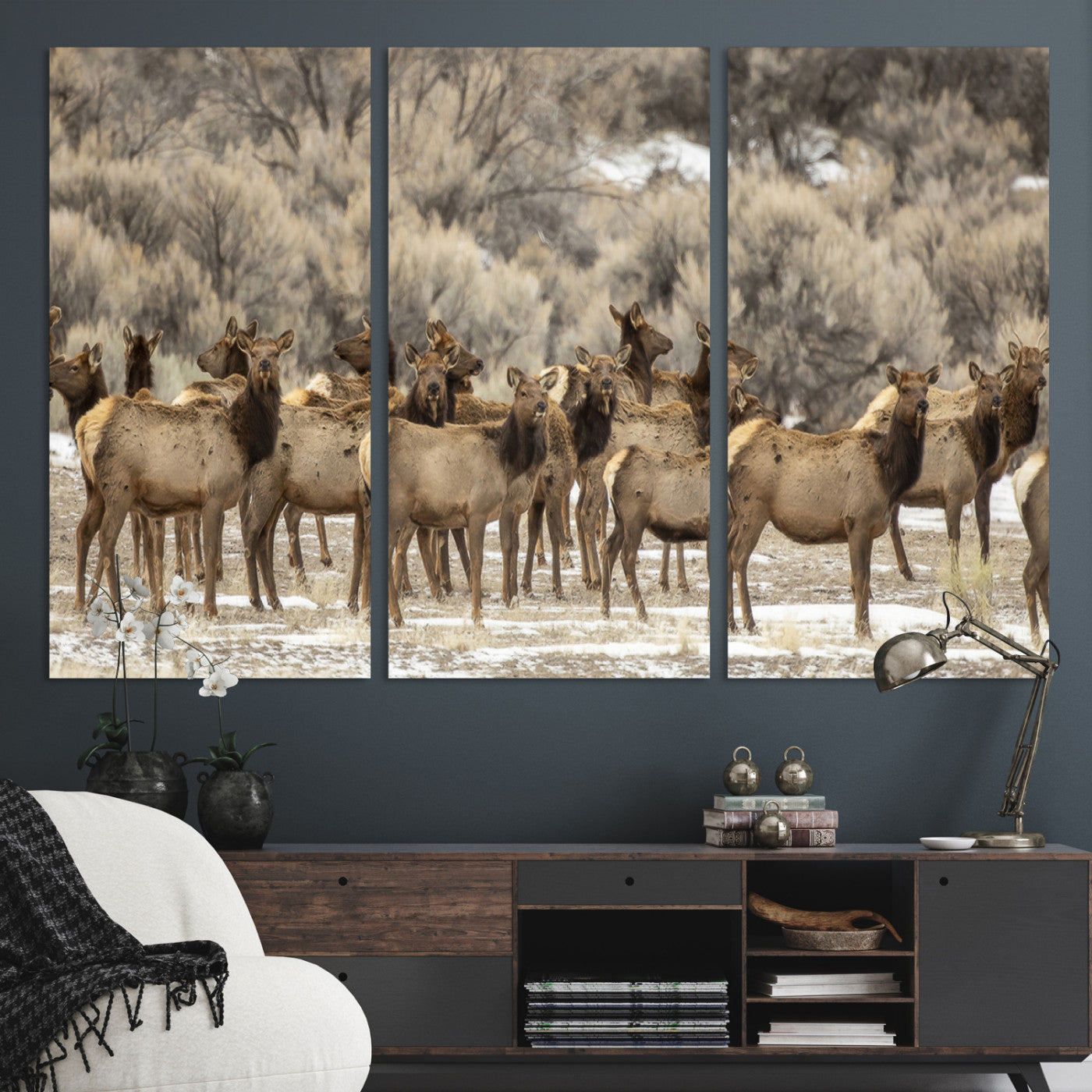 A large herd of elk standing in an open field with soft earthy tones, ideal for rustic lodge or western-themed home wall decor.