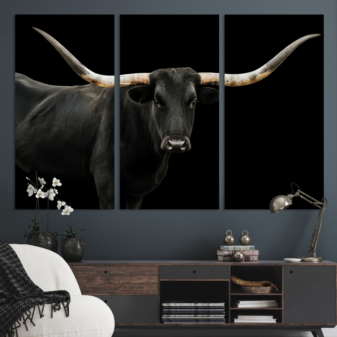 Close-up of a black Texas longhorn with large curved horns on black background, ideal for rustic farmhouse or modern western interiors.