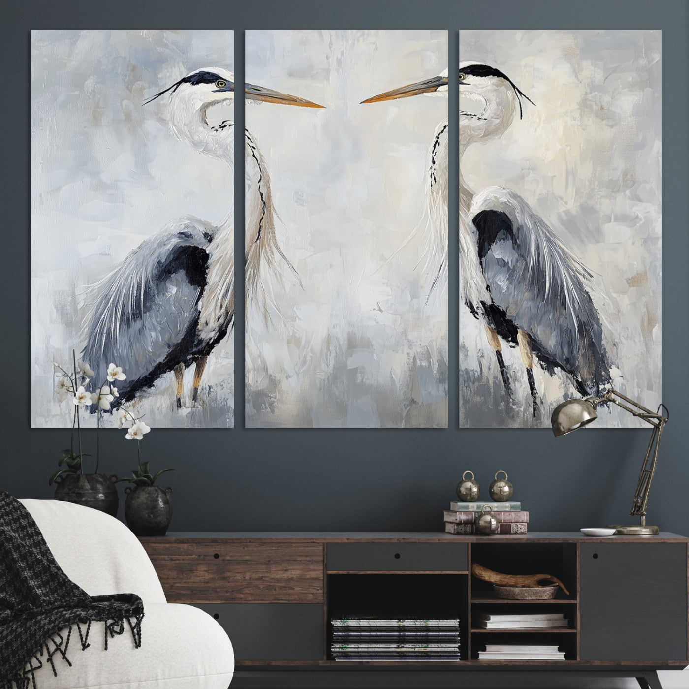 Two herons facing each other on a soft-toned background with blue-grey feathers, perfect for tranquil, coastal or nature-themed interiors.