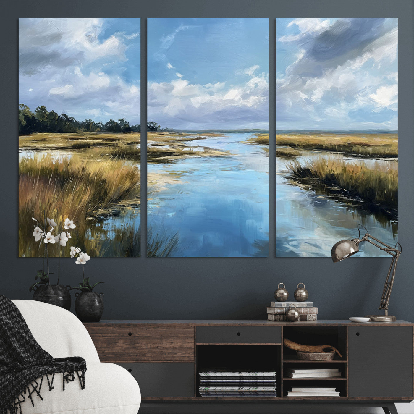 A beautiful, painterly landscape of a calm river winding through a marsh, with vibrant green grasses and a bright blue sky filled with fluffy clouds.