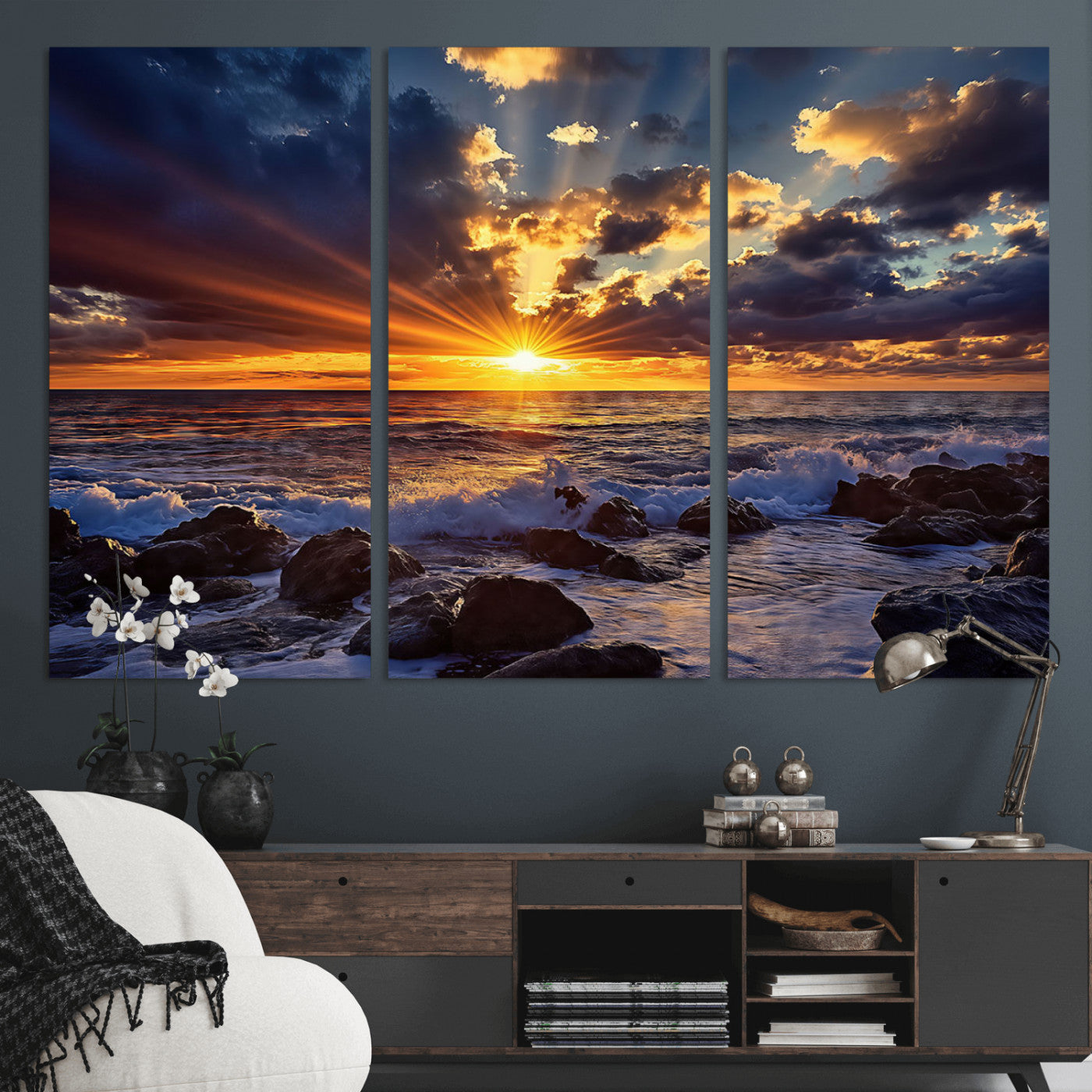 An explosive sunset over the ocean with dramatic clouds and rays of sunlight reflecting off the water, creating a vibrant and captivating view.