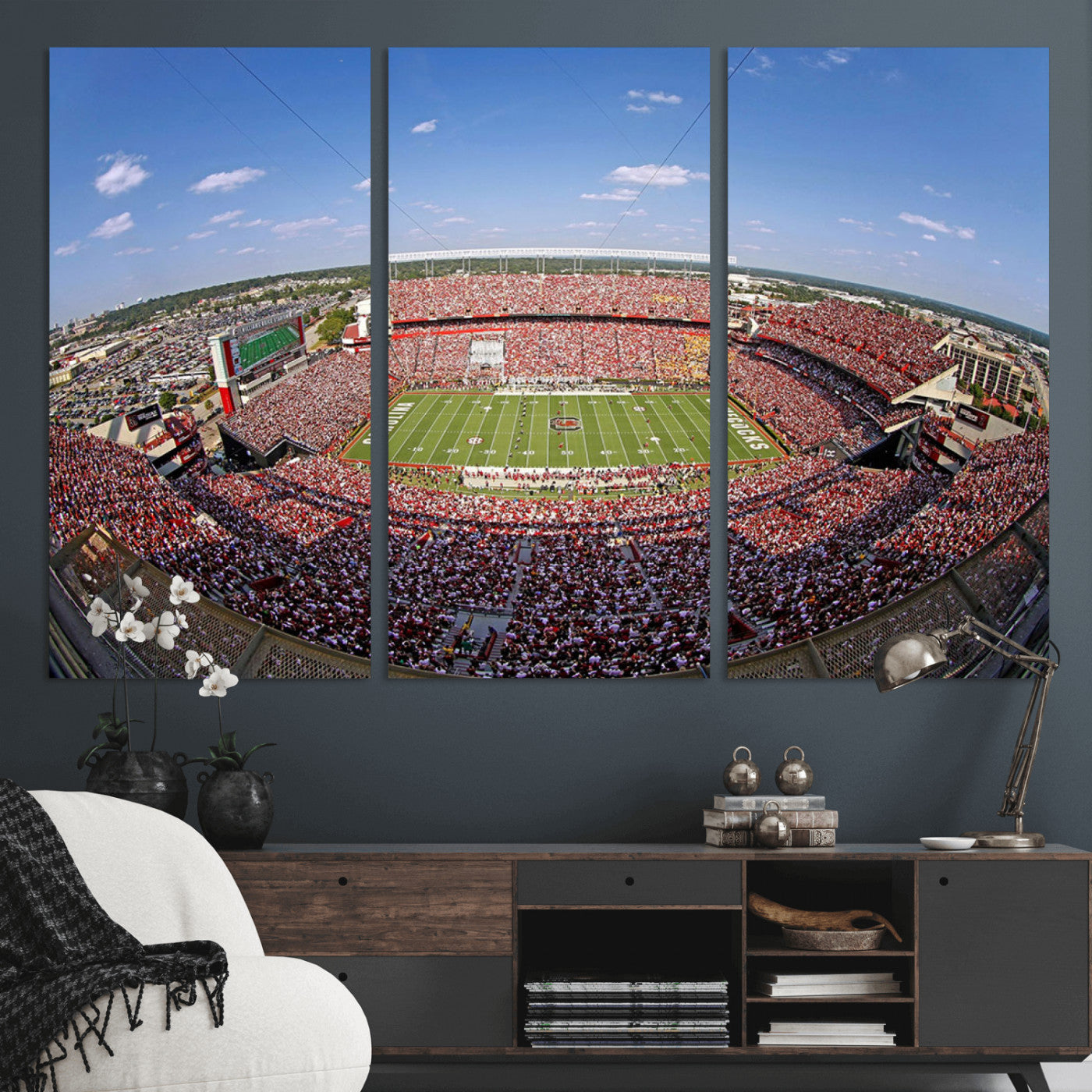 An William Brice-Stadium view of a full football stadium with cheering fans and clear blue skies, capturing the excitement and energy of the game.
