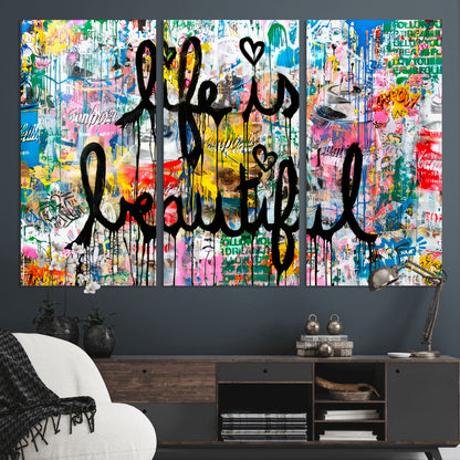 Colorful urban-style canvas with graffiti text “Life is Beautiful” in black paint, ideal for bold or street-themed home decor.