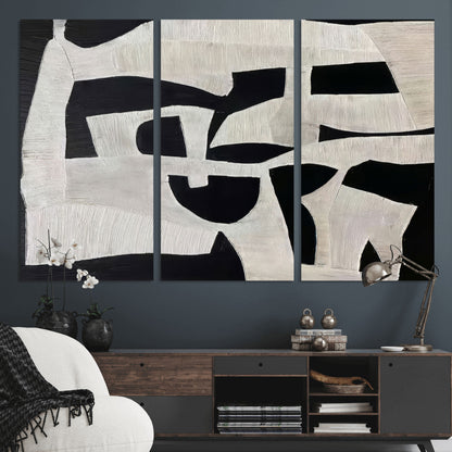 Minimalist black and white canvas featuring bold abstract textures and geometric shapes, ideal for modern neutral decor.