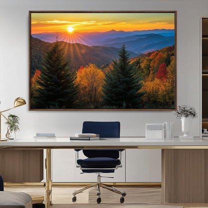 Vibrant sunset over autumn mountains with colorful trees and warm light, ideal for nature lovers or cabin-style wall decor.