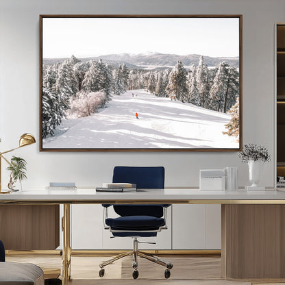 Bright ski trail lined with snow-covered pines and a skier in orange, perfect for alpine adventure or winter sports-inspired decor.