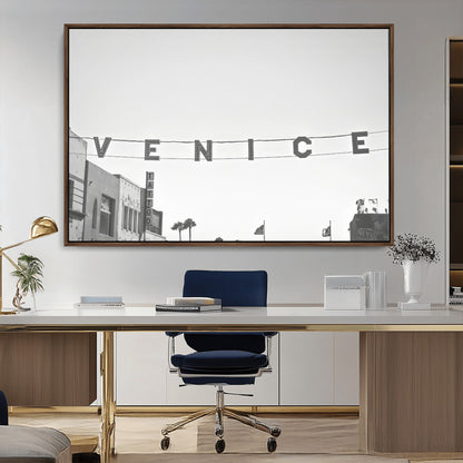 Black and white photo of Venice Beach sign and palm-lined street, perfect for urban coastal or minimalist LA-inspired wall decoration.