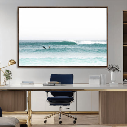 Minimalist photo of a lone surfer on calm aqua waves under bright sky, perfect for Scandinavian coastal or serene ocean-inspired home decor.