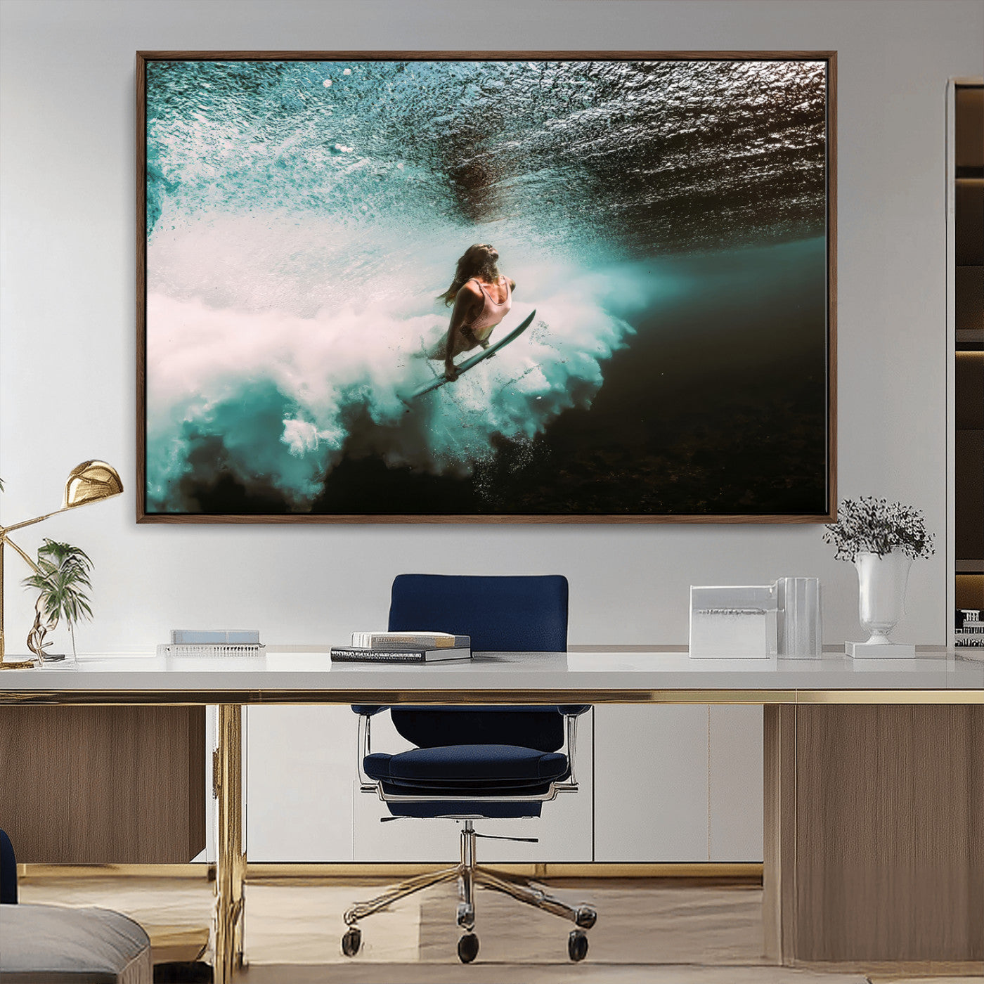 Vibrant underwater photo of a female surfer diving through turquoise waves, perfect for coastal boho or surf-inspired home decor.