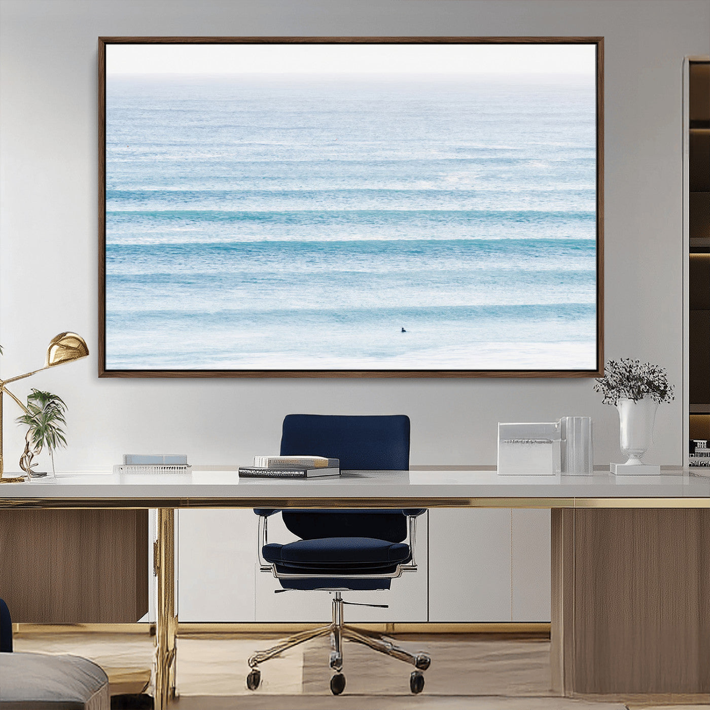 Minimalist ocean view with soft blue waves and a lone surfer, creating a serene and airy coastal aesthetic, perfect for tranquil home decor.