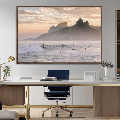 A surfer rides a golden hour wave near misty coastal mountains, surrounded by fellow surfers, capturing the spirit of a coastal adventure.
