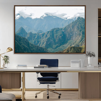 A misty mountain landscape with cloud-covered Andean peaks and lush green valleys, creating a dramatic and serene view, perfect for rustic or nature-inspired home decor.