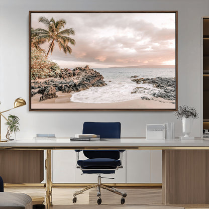 A peaceful beach scene with a palm tree and rocks, soft waves washing onto the shore under a soft pastel sky at sunset.