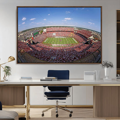 An William Brice-Stadium view of a full football stadium with cheering fans and clear blue skies, capturing the excitement and energy of the game.
