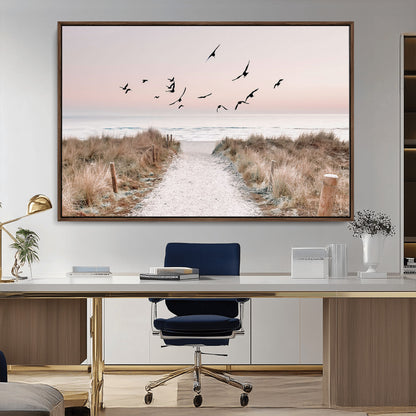 A peaceful coastal pathway leading to the ocean, with birds flying across a soft pastel sky, creating a calm and scenic beach atmosphere.