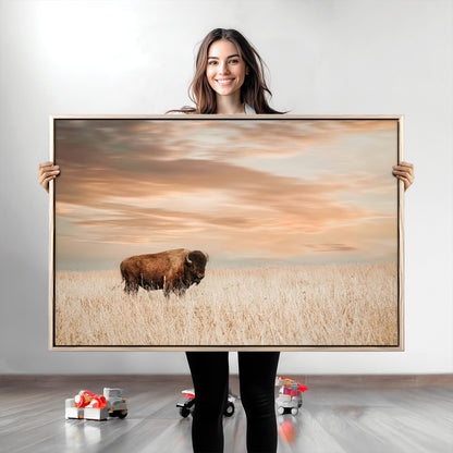 Bison Wall Art Print - Buffalo Canvas Print, featuring a lone bison in a golden prairie under a warm sunset sky, perfect for rustic and farmhouse decor.