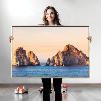Framed canvas of El Arco rock formation in Cabo San Lucas at golden hour, ideal for coastal landmark or ocean-inspired decor.