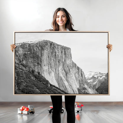 Monochrome canvas of El Capitan’s granite wall in Yosemite with snowy peaks, ideal for dramatic mountain or black-and-white nature decor.