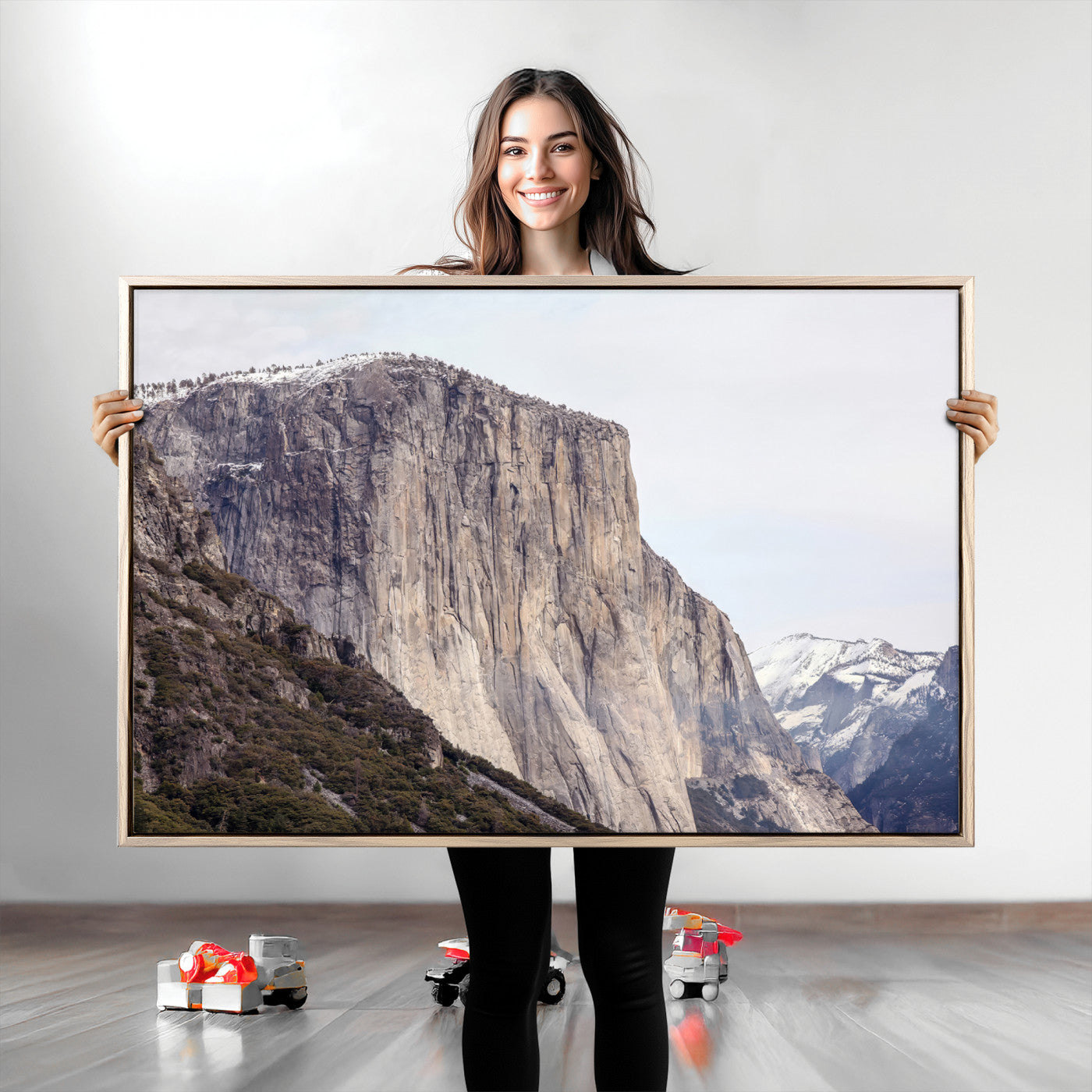 Framed canvas of El Capitan’s vertical granite face in Yosemite with snowy peaks, ideal for Sierra minimalism or mountain-inspired decor.