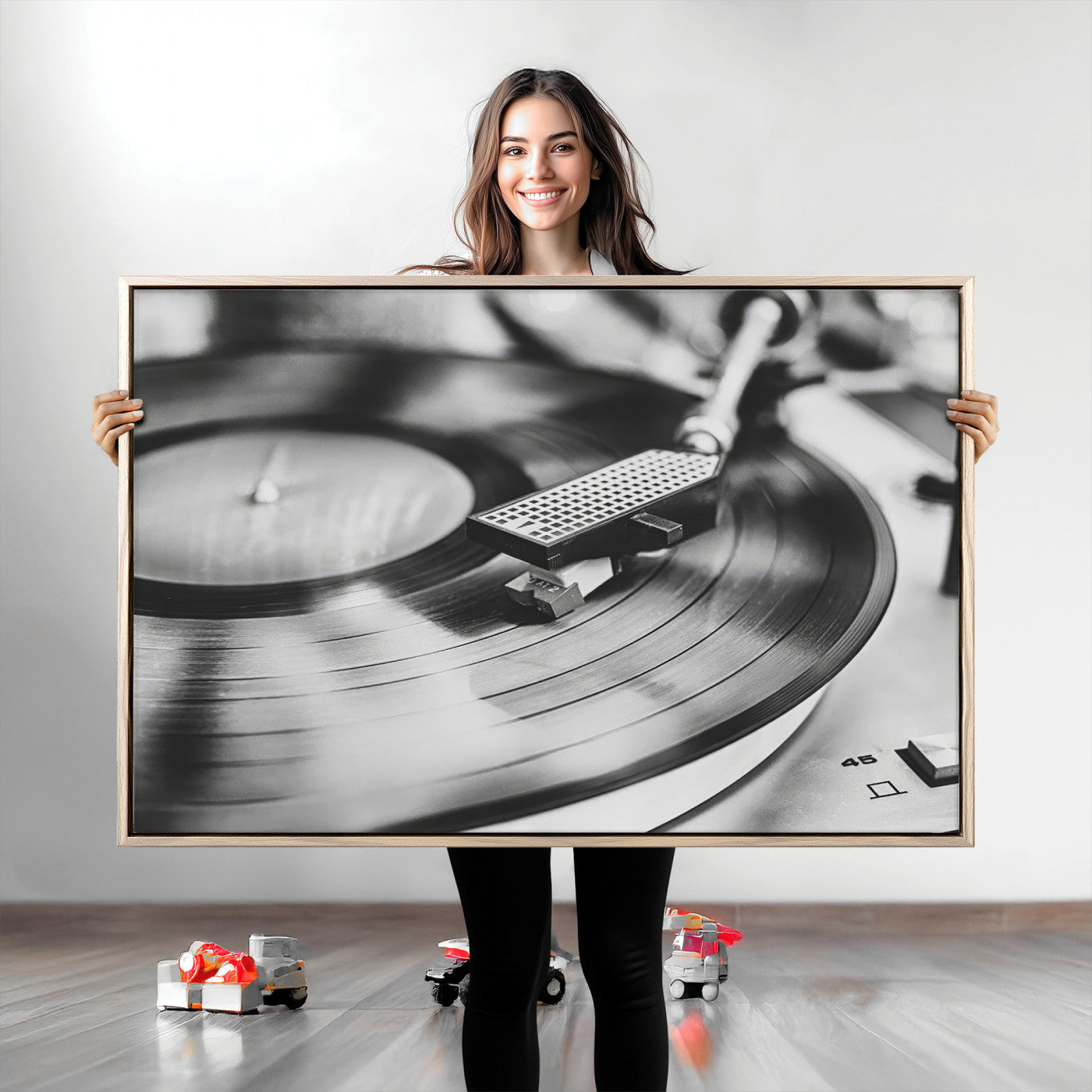 Black and white close-up of a vinyl record player with moody tones, ideal for vintage industrial or retro-style home decor.