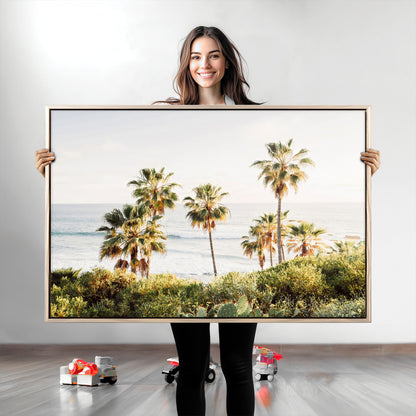 Framed print of sunlit palm trees on the California coast with warm tones, perfect for coastal minimalist or beach-style home decor.