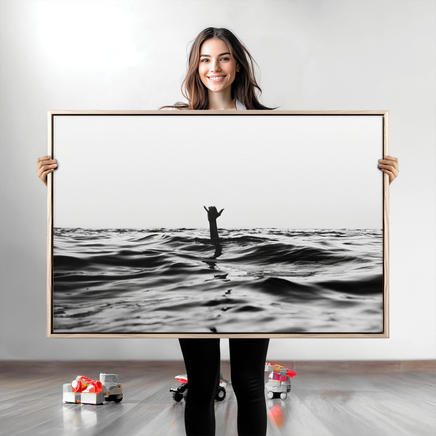 Black and white ocean with a hand making a surfer sign among dark waves, creating a dramatic and minimalist seascape with bold contrast.