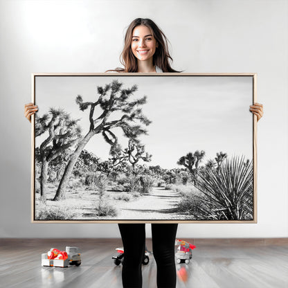 Canvas of a Joshua Tree forest in black and white tones, featuring a desert path and spiky vegetation, ideal for minimalist or rustic decor.