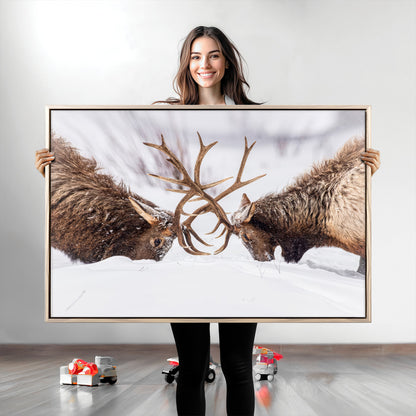 Two elk clashing antlers in a snowy forest, capturing raw power and wild energy, ideal for rustic cabin or lodge-style decor.