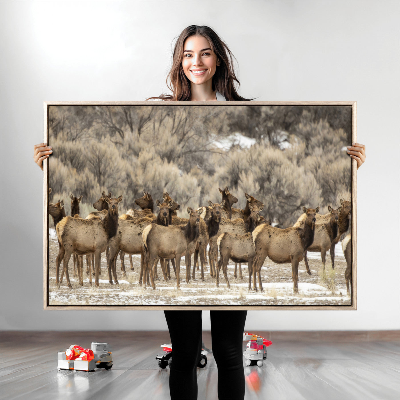 A large herd of elk standing in an open field with soft earthy tones, ideal for rustic lodge or western-themed home wall decor.