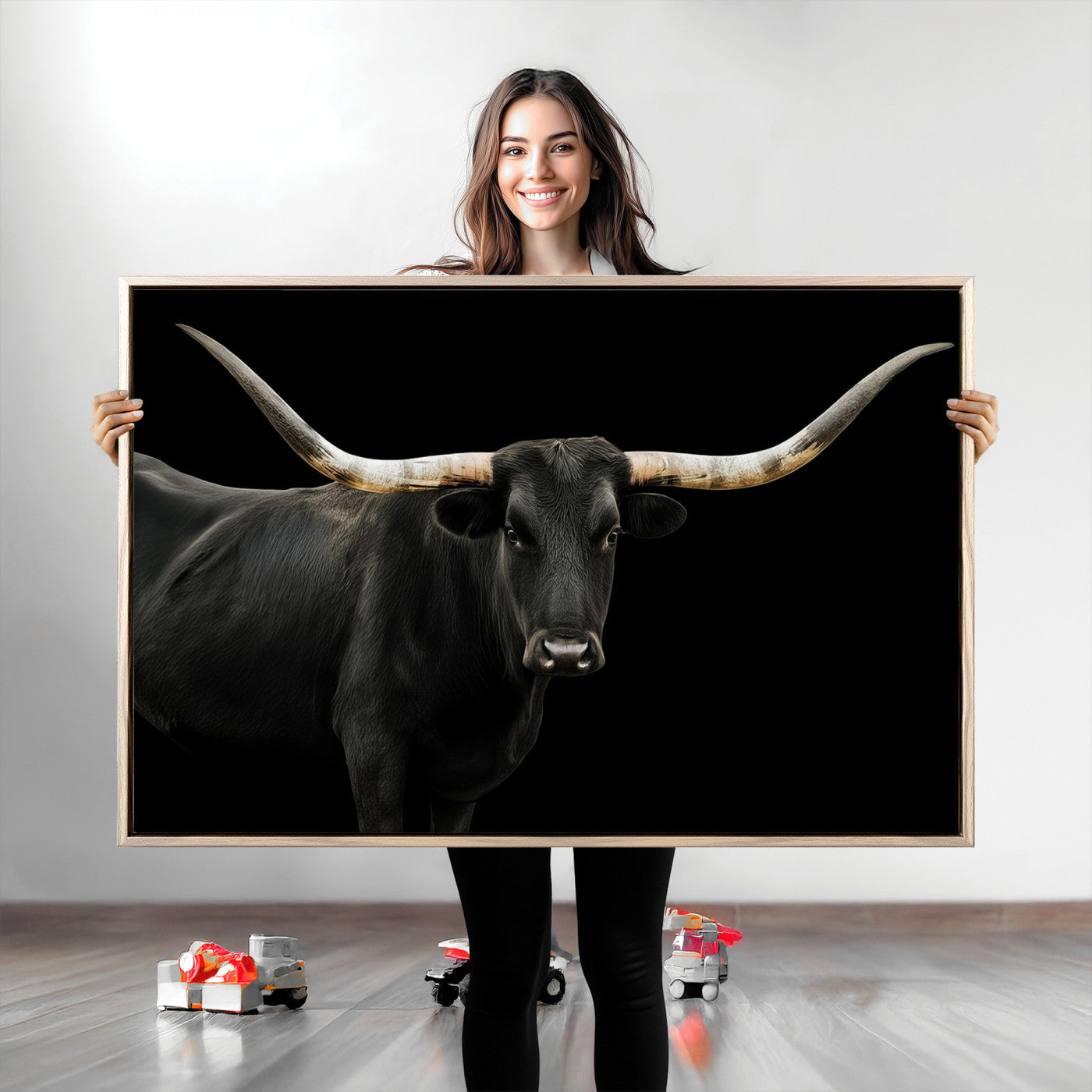 Close-up of a black Texas longhorn with large curved horns on black background, ideal for rustic farmhouse or modern western interiors.