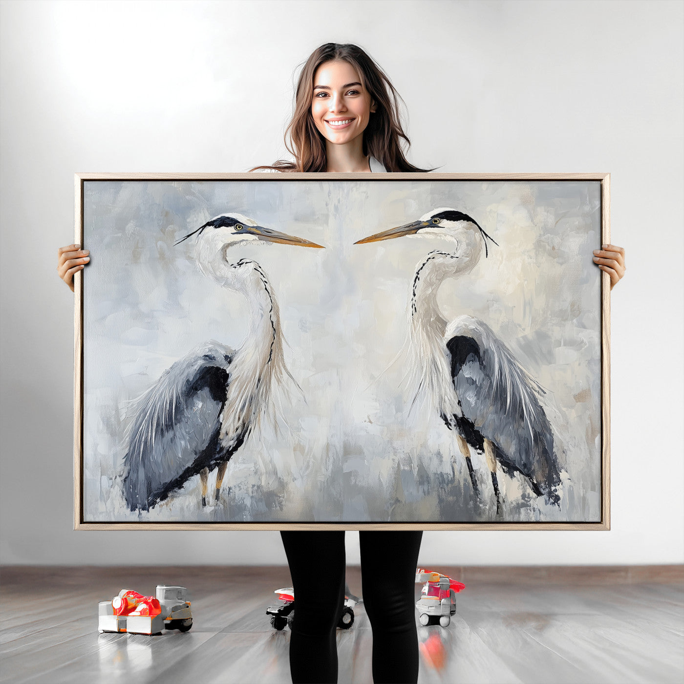 Two herons facing each other on a soft-toned background with blue-grey feathers, perfect for tranquil, coastal or nature-themed interiors.