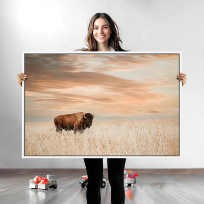 Bison Wall Art Print - Buffalo Canvas Print, featuring a lone bison in a golden prairie under a warm sunset sky, perfect for rustic and farmhouse decor.