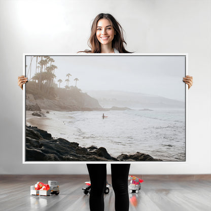 Framed canvas of a surfer in misty coastal tones at a foggy California beach, ideal for minimalist coastal beach or serene ocean-themed decor.