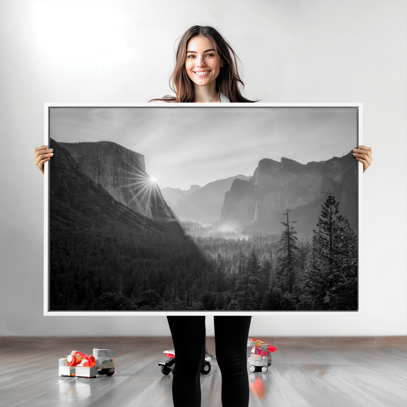 Black and white landscape of Yosemite with sun rays peeking over El Capitan, ideal for moody nature or modern rustic decor.