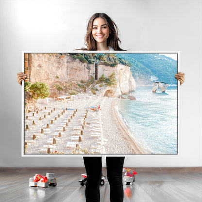 Wall art of a calm Mediterranean beach with rows of sun loungers and umbrellas in soft pastel tones, perfect for light coastal or vacation-themed decor.