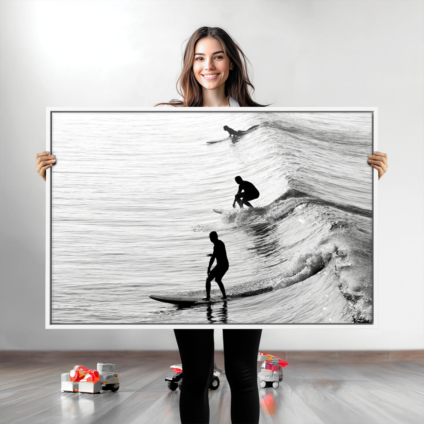 Black and white photo of surfers riding waves in a moody, high-contrast scene, ideal for modern coastal or surf-inspired home decor.