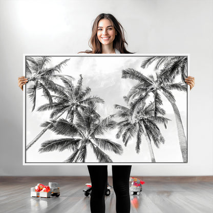Black and white tropical palm trees viewed from below, swaying gently against a bright sky, creating a serene and elegant coastal atmosphere.
