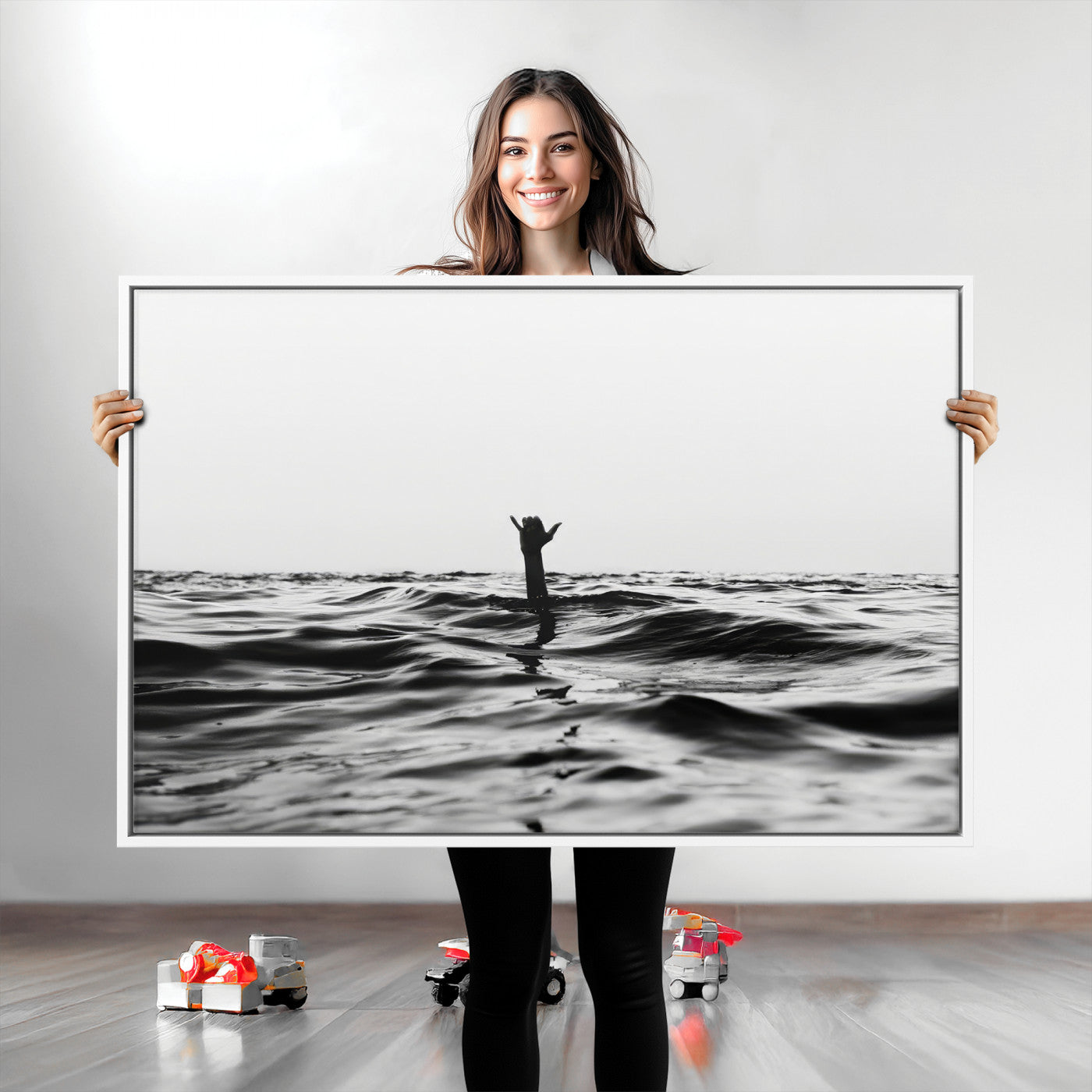 Black and white ocean with a hand making a surfer sign among dark waves, creating a dramatic and minimalist seascape with bold contrast.