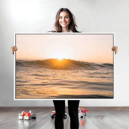 Ocean waves glowing under a warm golden sunset, reflecting soft light and calm movement, perfect for warm minimalist coastal interiors.