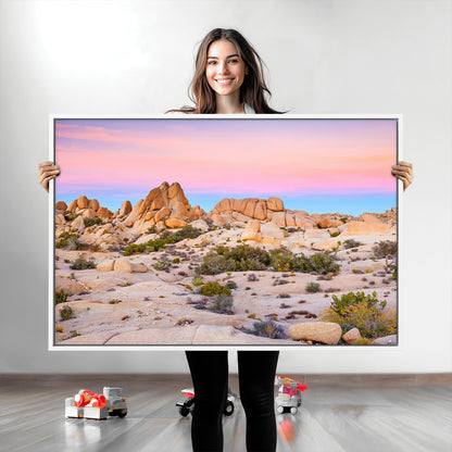 A breathtaking desert landscape featuring rugged rock formations under a vibrant pastel sunset sky, capturing the warmth and serenity of a Southwestern wilderness.