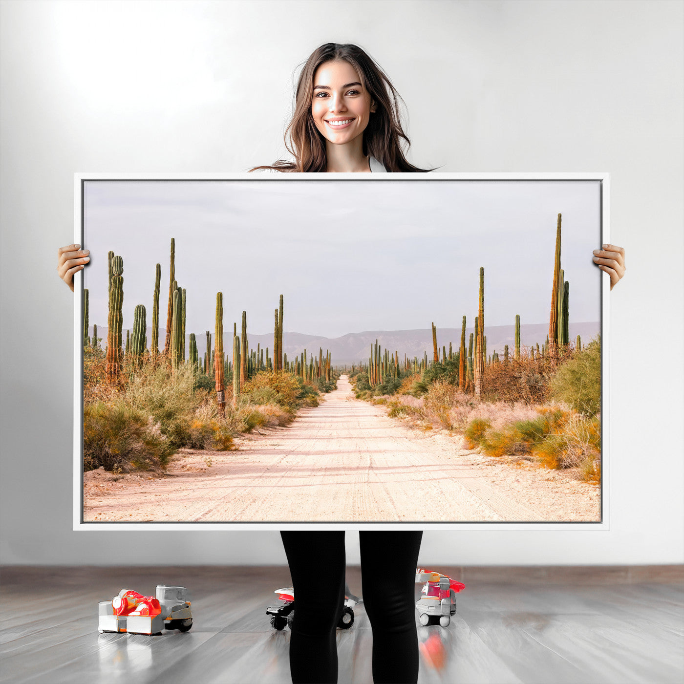 A desert road lined with saguaro cacti under a golden sky, creating a warm southwestern feel, perfect for boho or rustic decor.