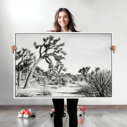 Canvas of a Joshua Tree forest in black and white tones, featuring a desert path and spiky vegetation, ideal for minimalist or rustic decor.