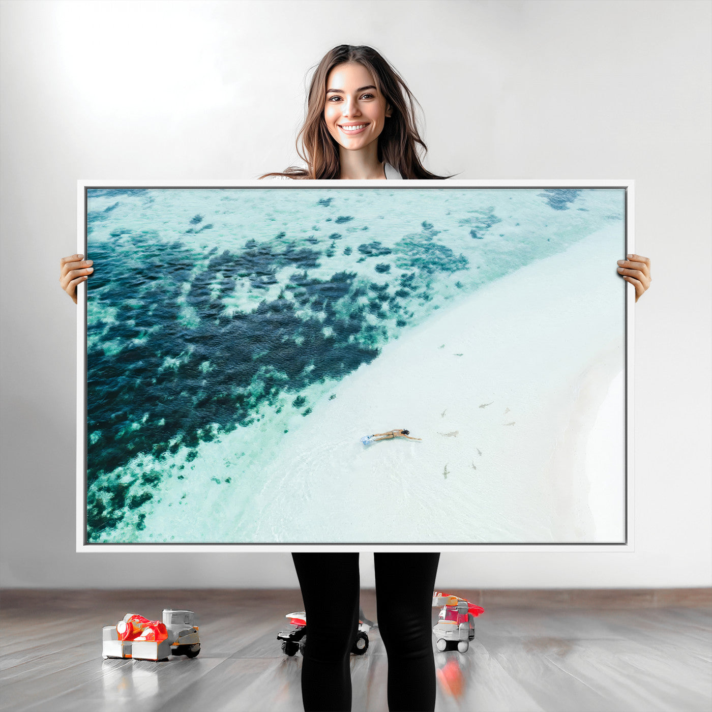 Canvas featuring an aerial view of a swimmer in shallow turquoise waters with coral patterns, ideal for tropical coastal home decor.