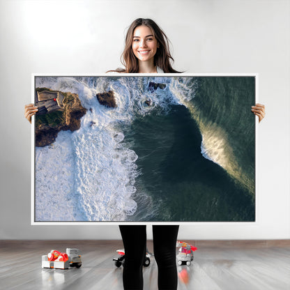 Canvas showing an aerial view of crashing waves along the Nazaré coastline, perfect for dramatic coastal or ocean-themed home decor.
