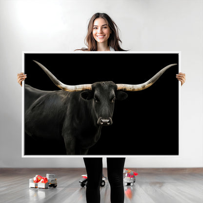Close-up of a black Texas longhorn with large curved horns on black background, ideal for rustic farmhouse or modern western interiors.